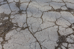 Sealcoating can prevent further damage on minimal cracks such as these.