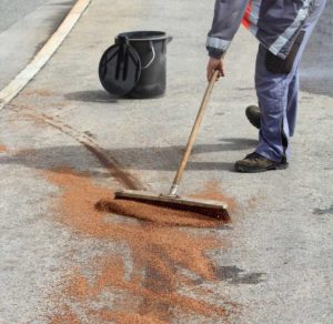 Cleaning oil stain on the driveway